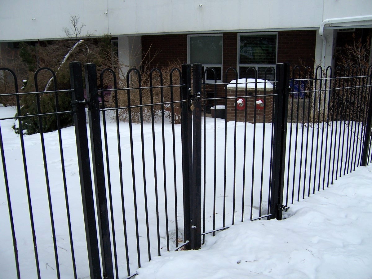 This image shows a locked fence obstructing access to a fire department connection (FDC). Fire Safety Concern: 🚨
🔴 Obstructed FDC – Firefighters need quick access to the Siamese connection to supply water in emergencies. A locked gate can delay response times.
🔴 Code Violation Risk – Fire codes typically require clear access to FDCs for fire department use.
🔴 Potential Hazard – In winter conditions (as shown), snow and ice can further obstruct access. Recommended Actions:
✔️ Remove or Relocate the Fence – Ensure an unobstructed pathway to the FDC.
✔️ Install Breakaway Locks – If security is necessary, use approved breakaway locks or chains accessible to firefighters.
✔️ Post Clear Signage – Mark the area with "Fire Department Connection – Keep Clear" signs.
✔️ Consult Fire Authorities – Ensure compliance with local fire codes and emergency responder requirements.